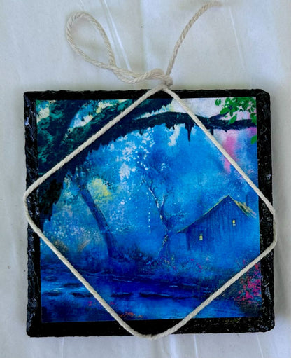 Handcrafted slate coaster featuring COTTAGE illustration.