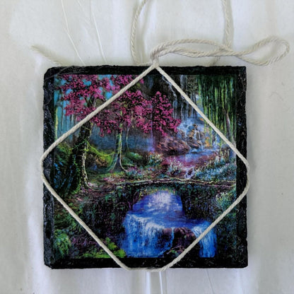 Handcrafted slate coaster featuring a forest in Eden illustration.